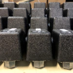 a row of black blocks with the letters t on them